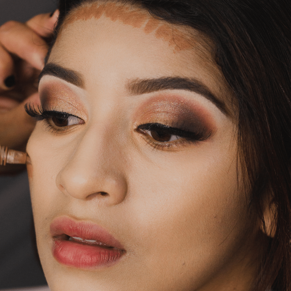 makeup being applied to face