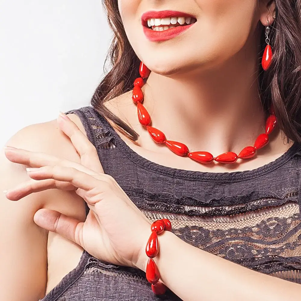 What materials are used to make Red and Black bracelet?