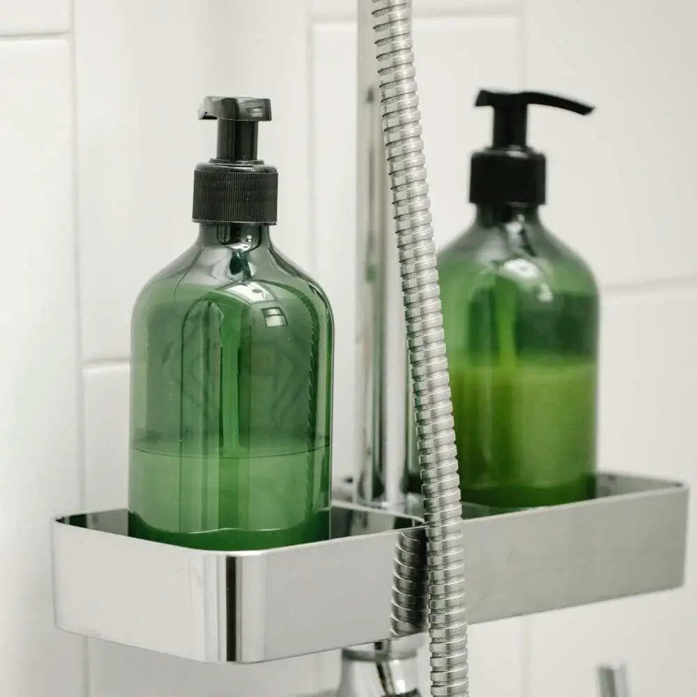 Luxurious Korean shampoo and conditioner bottles on bathroom shelf