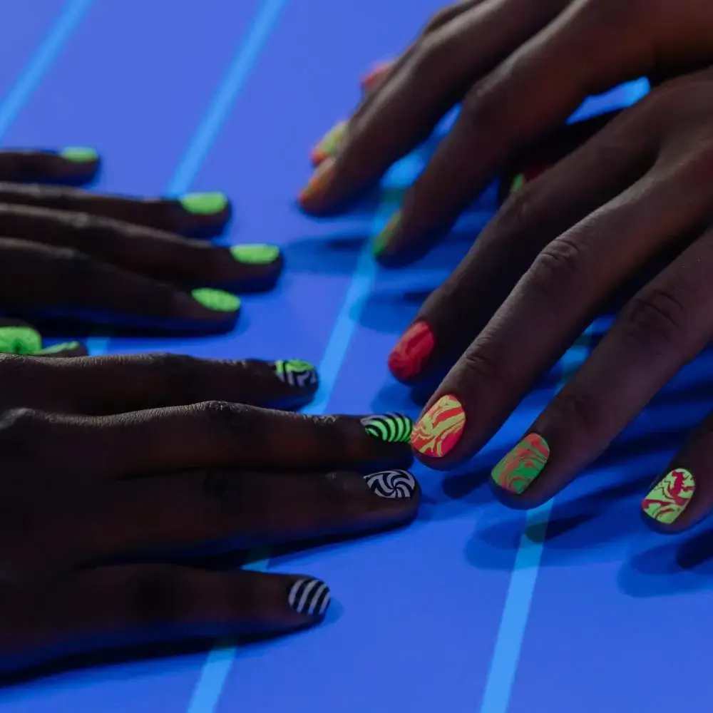 Close-up view of nail art created with top stamping polish