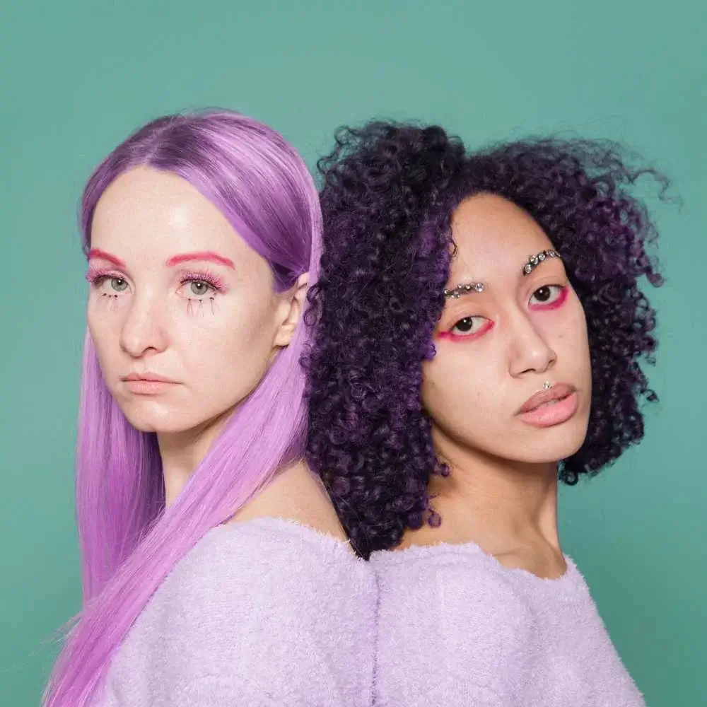 Women flaunting her radiant hair dyed with high-quality purple dye