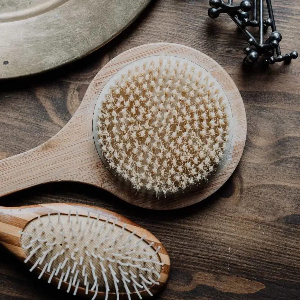 Top brush for hair extensions with its unique, soft bristles