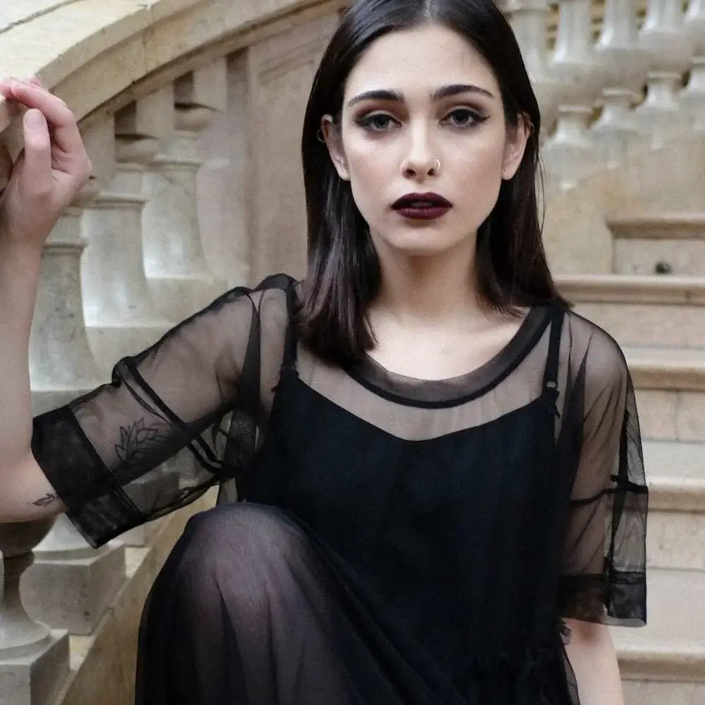 Stunning model showcasing the dramatic effect of the best black liquid lipstick