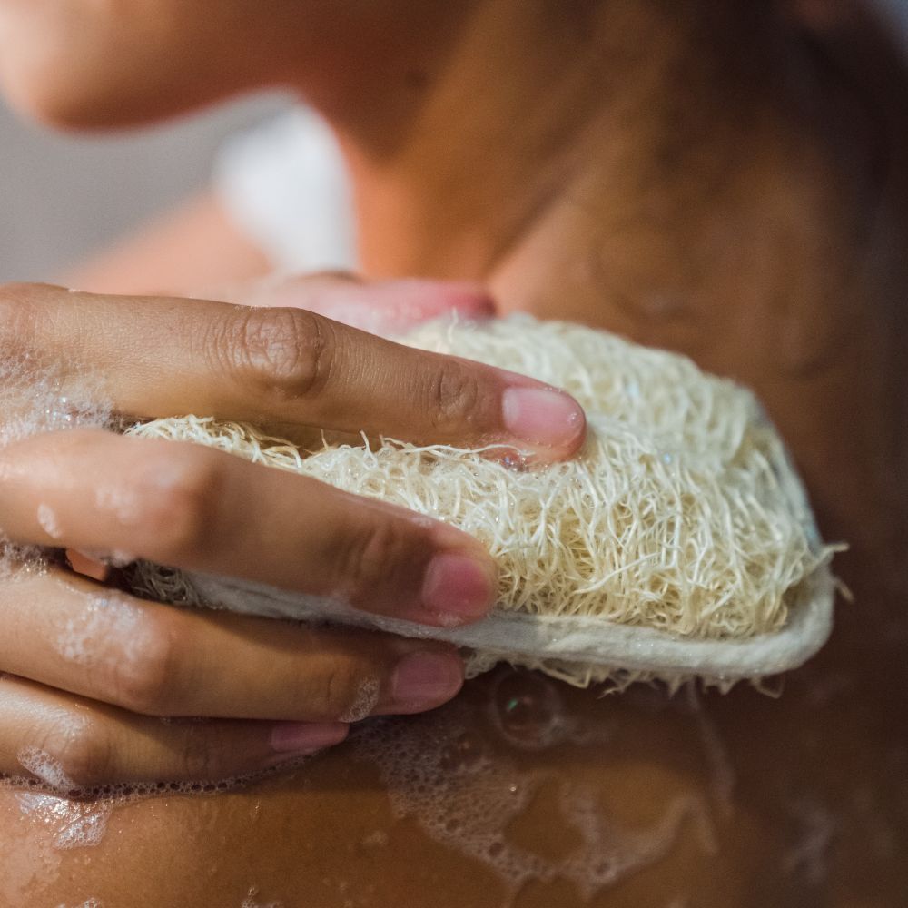 lather the body wash to your skin using a loofah