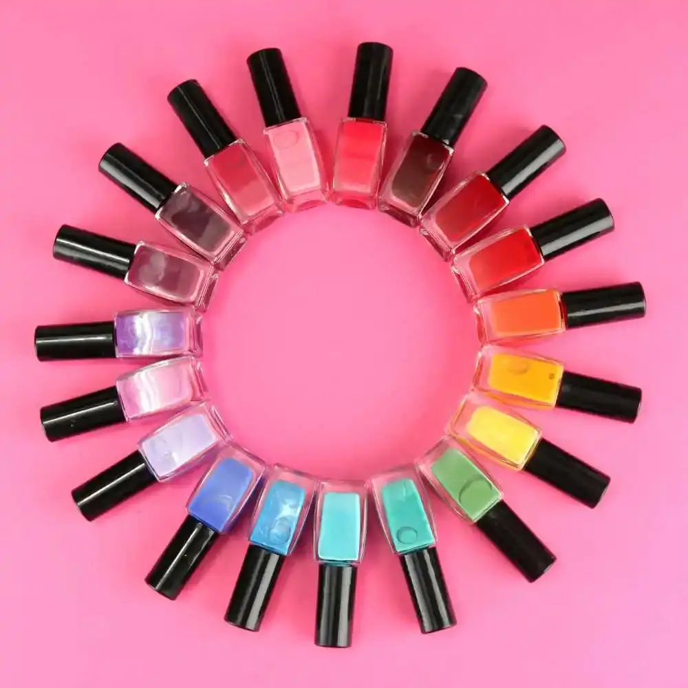 different colors of nail polish arranged in a circular pattern