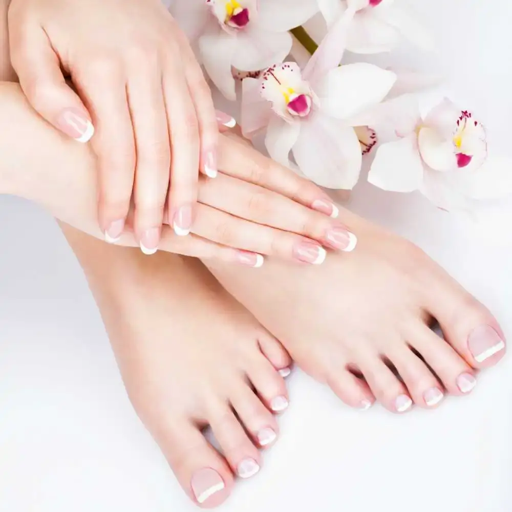hands and feet with french tip nails