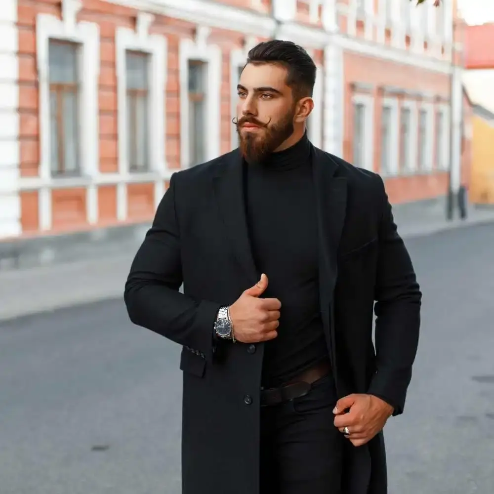 man on the street with beard and wearing black clothes