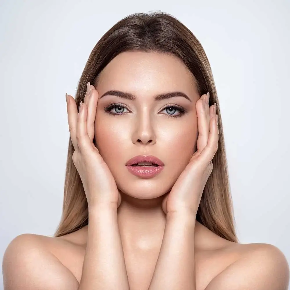 closeup portrait of a woman with makeup and flawless skin