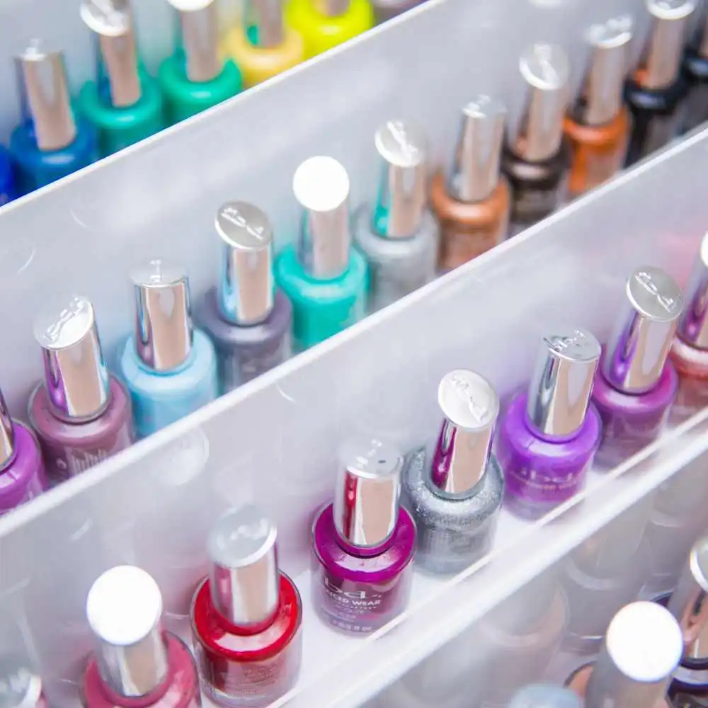 different colors of nail polishes arranged in rows