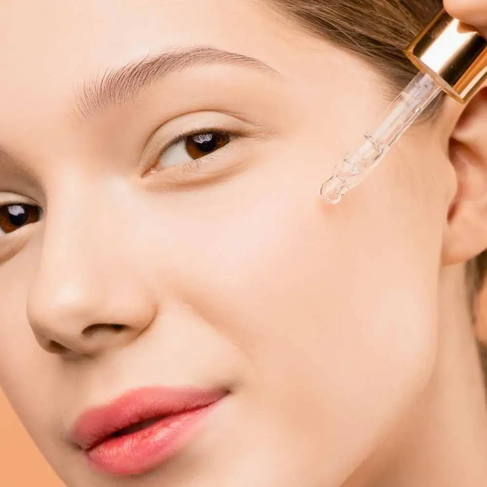 application of facial oil on the skin