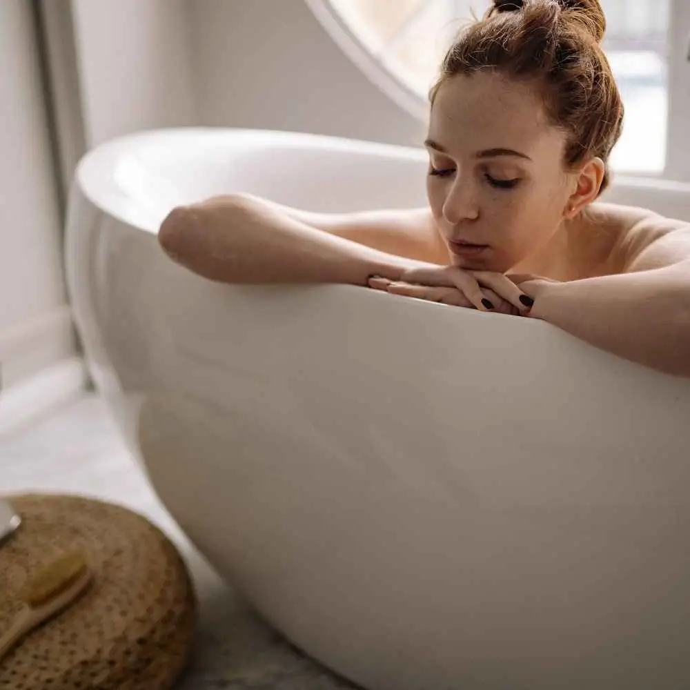 a woman taking a bath
