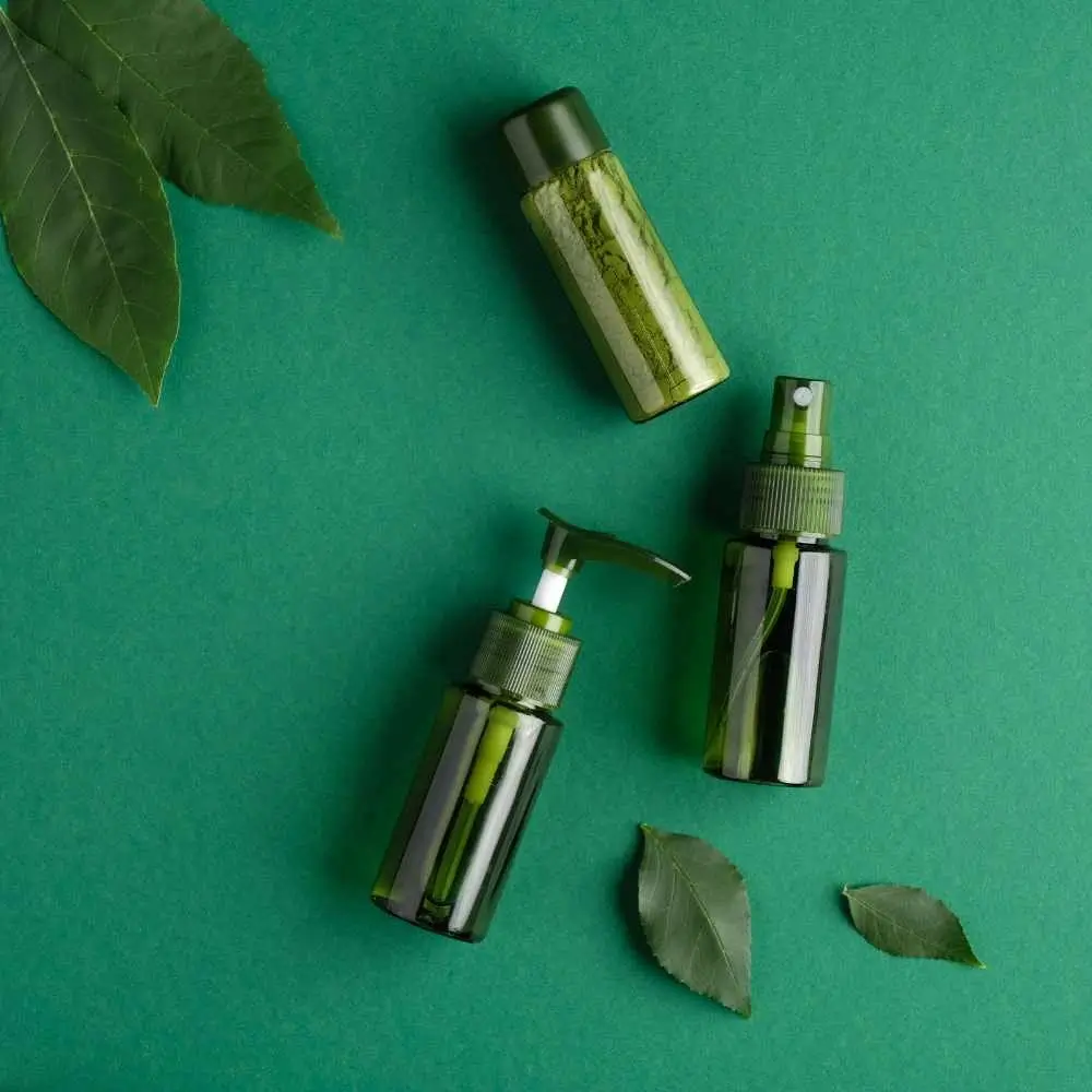vegan beauty products in green bottles