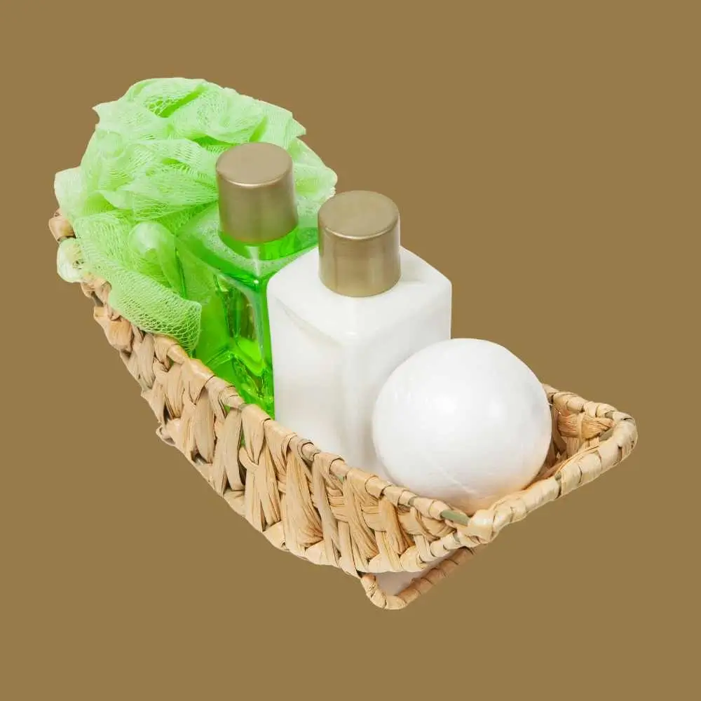 body washes in a basket with a green body scrubber