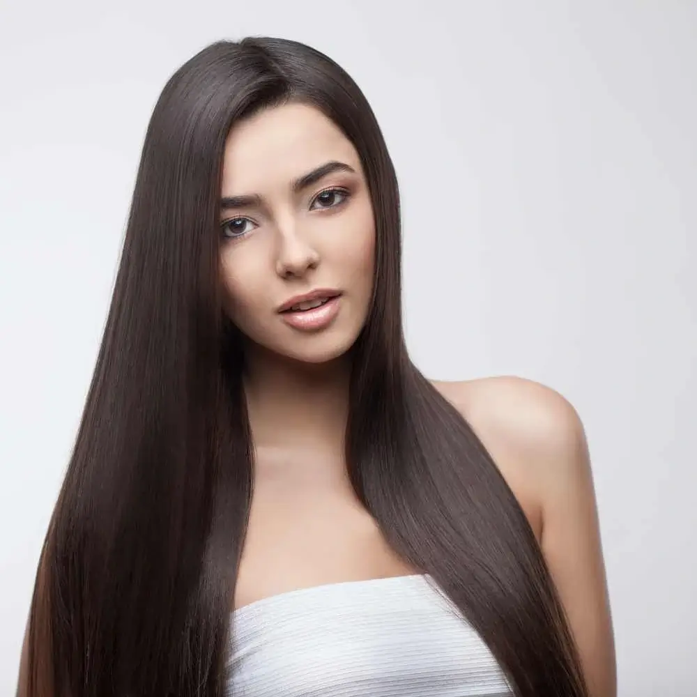 brunette young woman with long straight hair