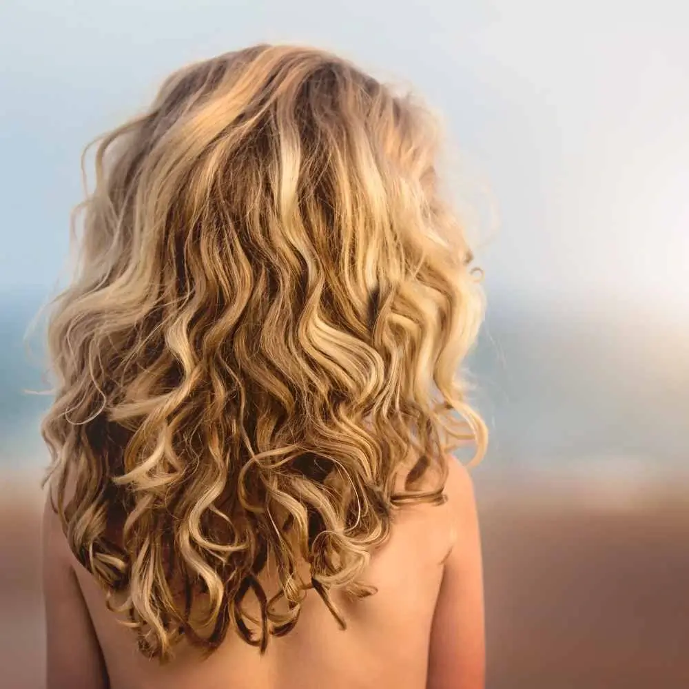 curly blonde hair