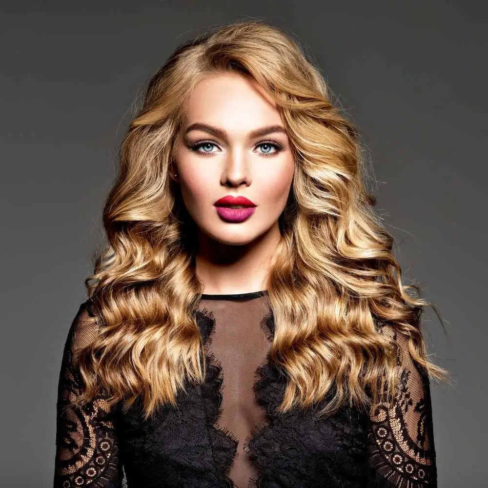 blonde woman with curled hair
