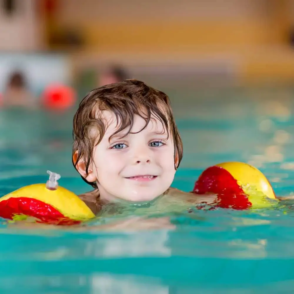 A young boy on the pool