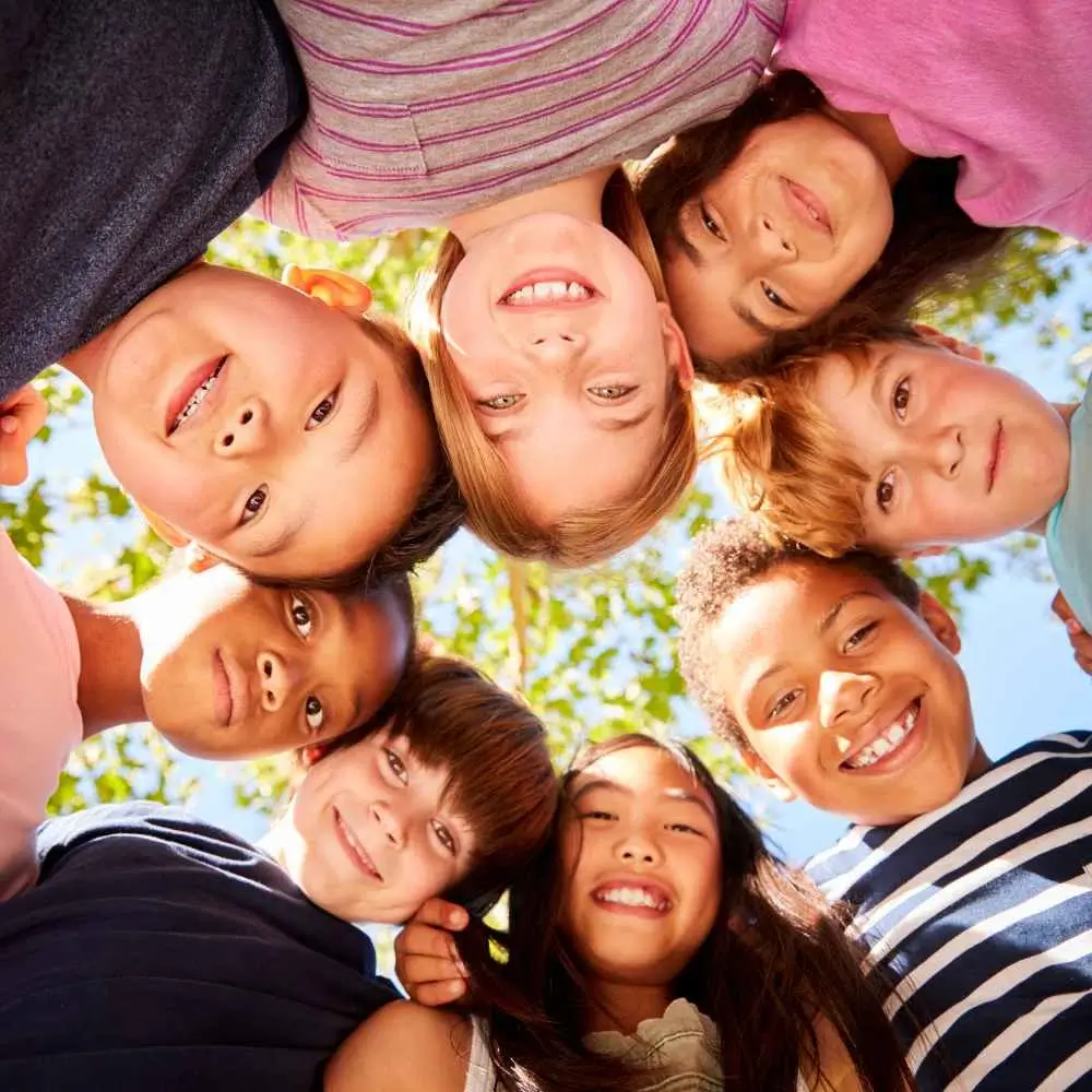 Faces of kids smiling