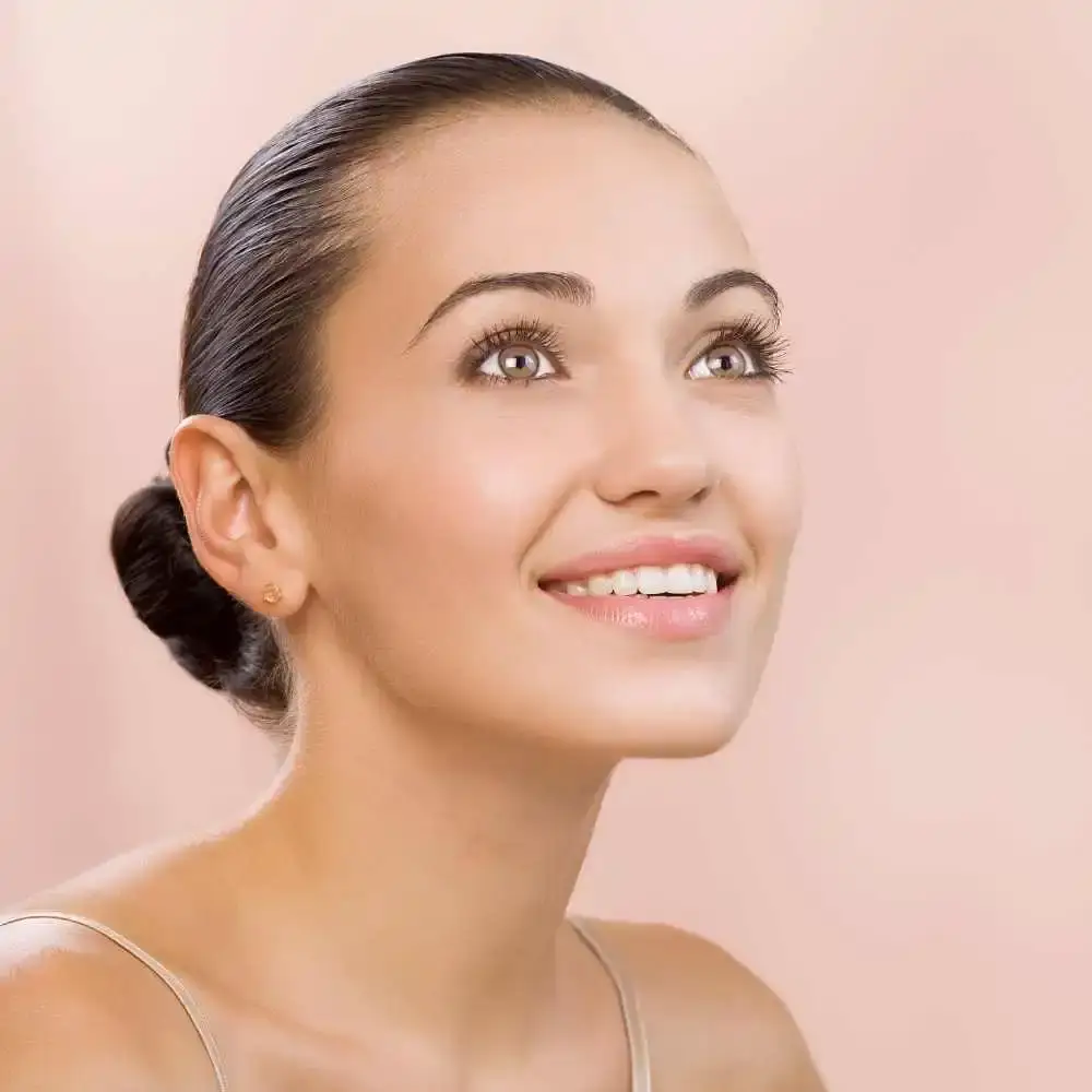 closeup portrait of a woman with minimal makeup and clean eyebrows