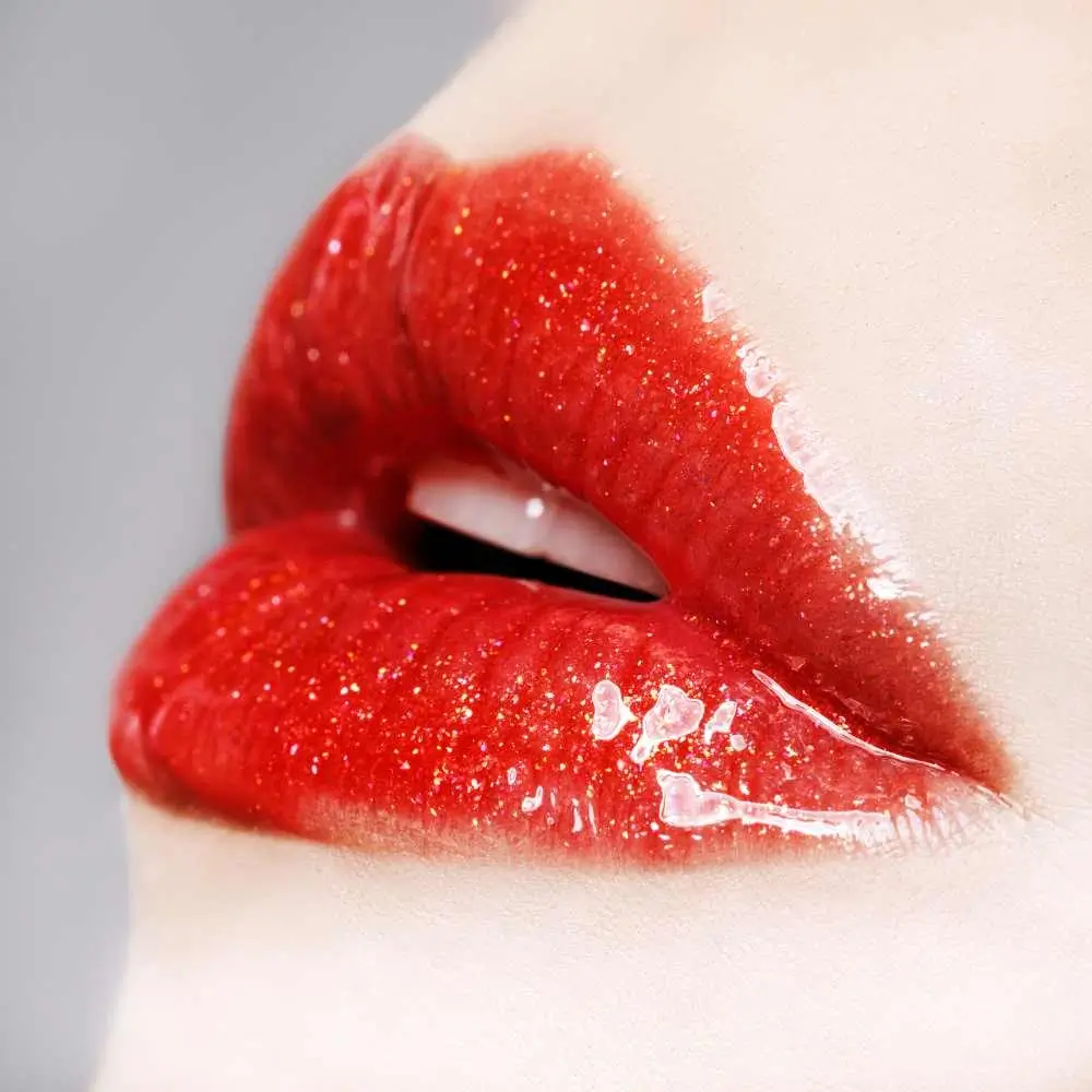 closeup view of red glittery lips