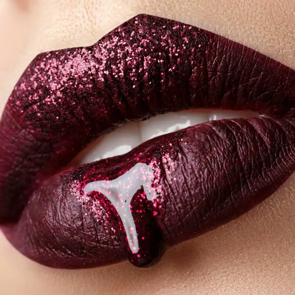 lips in glittery maroon lipstick