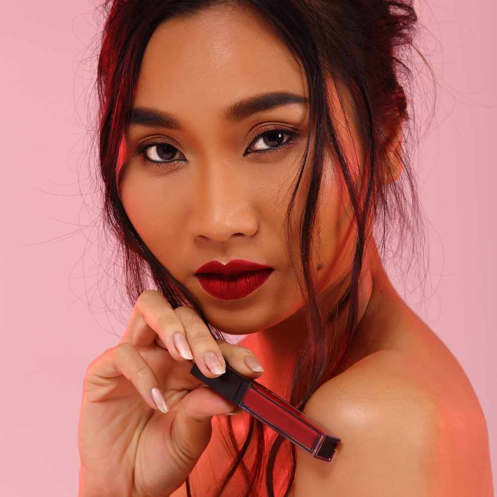 asian woman wearing a red liquid lipstick