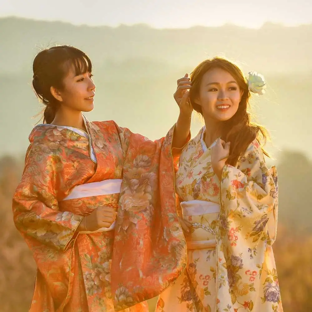 two Japanese women wearing traditional Japanese clothing