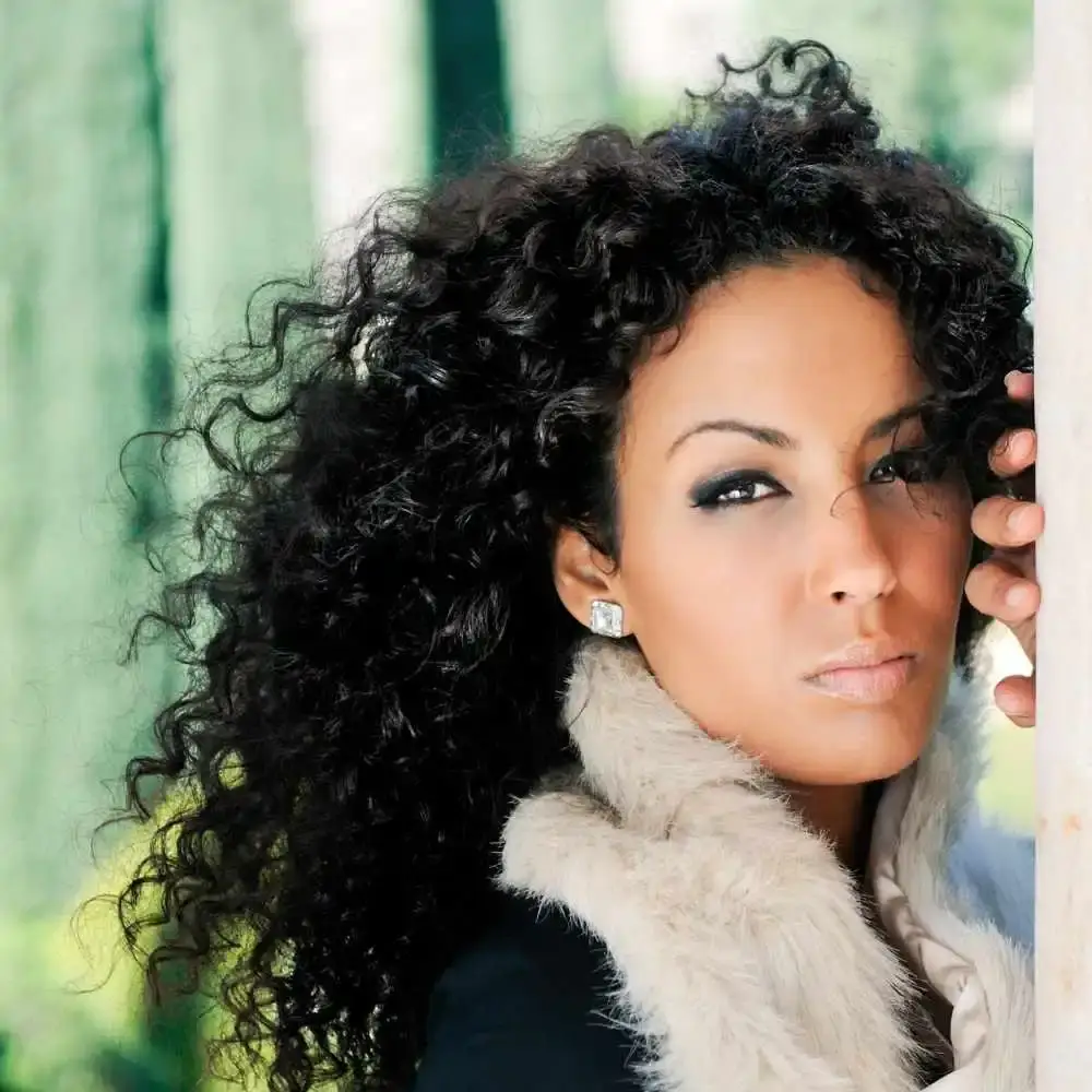 woman with black curly hair