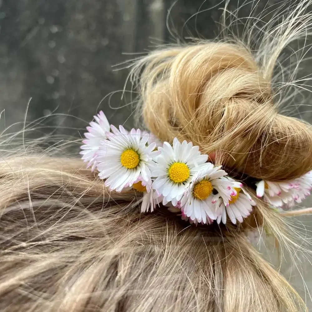 frizzy hair in a bun