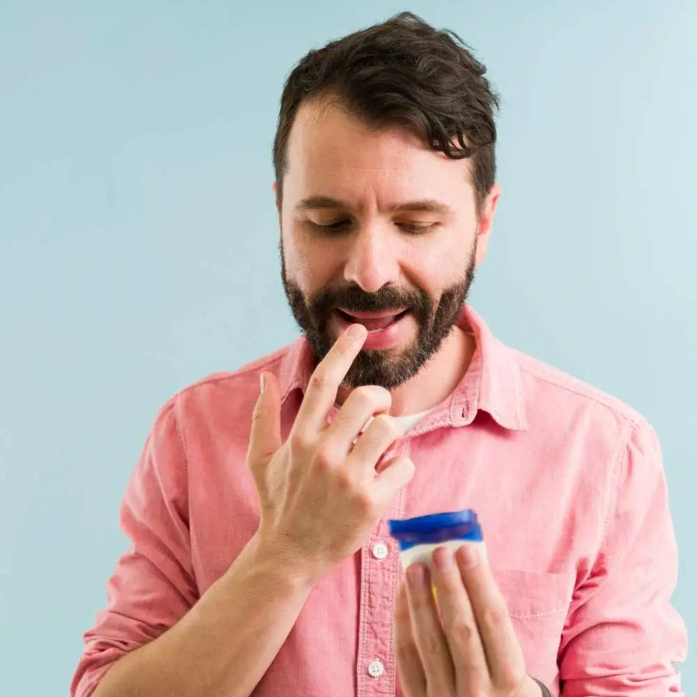 applying lip balm