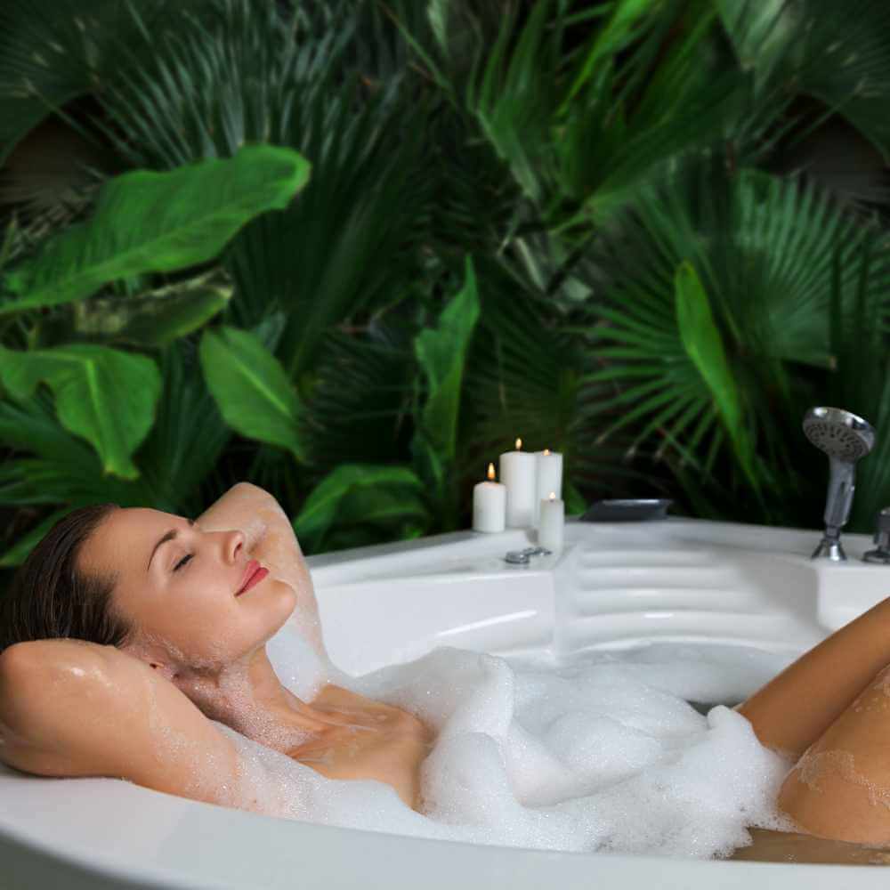 woman relaxing on a bath tub