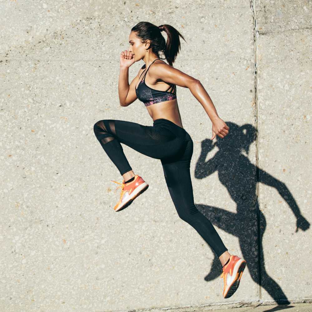 fit woman exercising outdoors