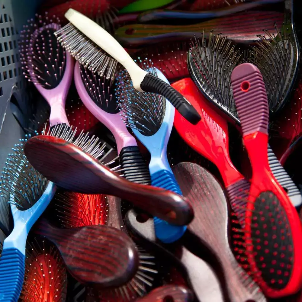 different colors and types of hair brushes