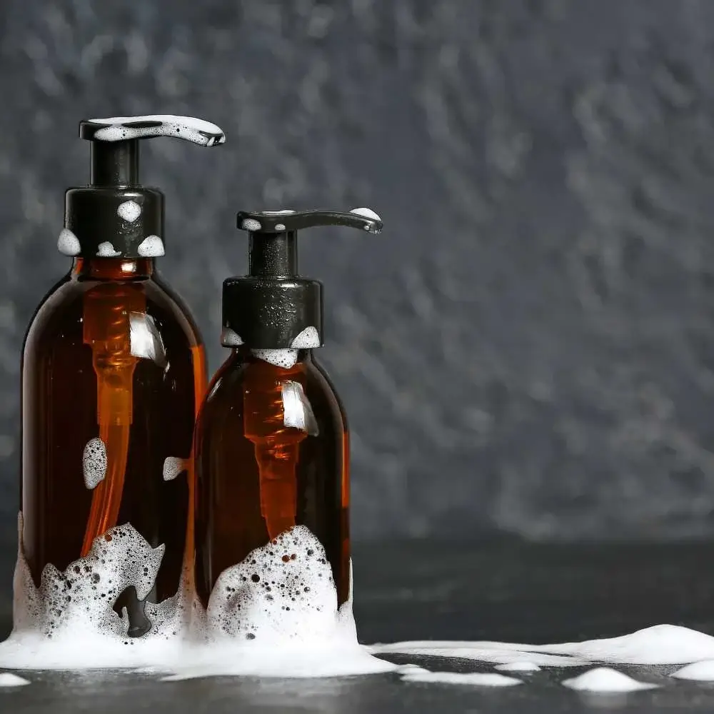 Bottle of anti-dandruff shampoo, a solution for itchy scalp