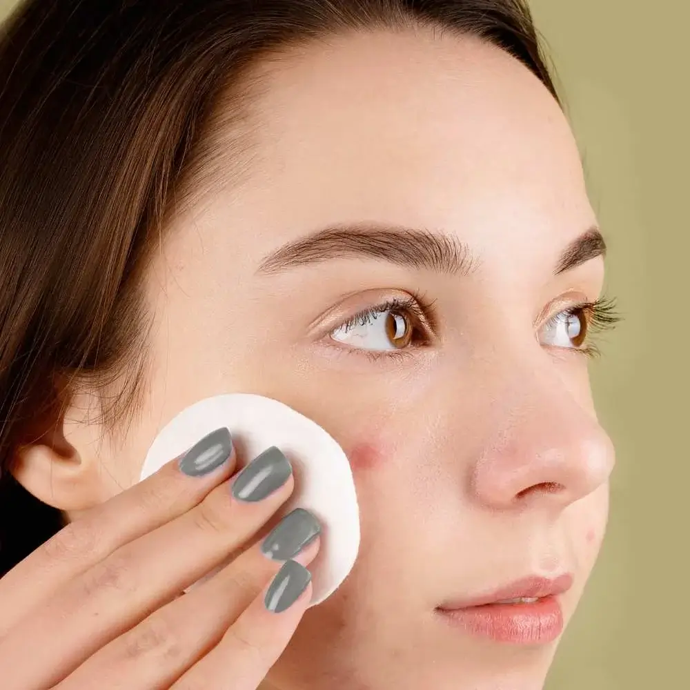 applying primer specifically formulated for acne-prone skin
