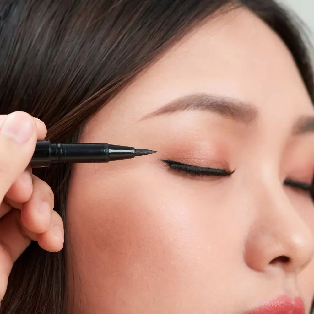 Stunning close-up of a dramatic cat-eye look achieved with water-activated eyeliner