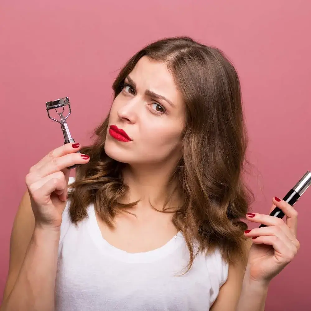 Side-by-side comparison of a heated and non-heated eyelash curler