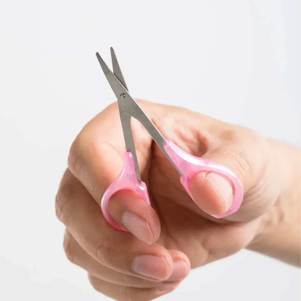 Close-up image of professional eyebrow scissors with sharp blades