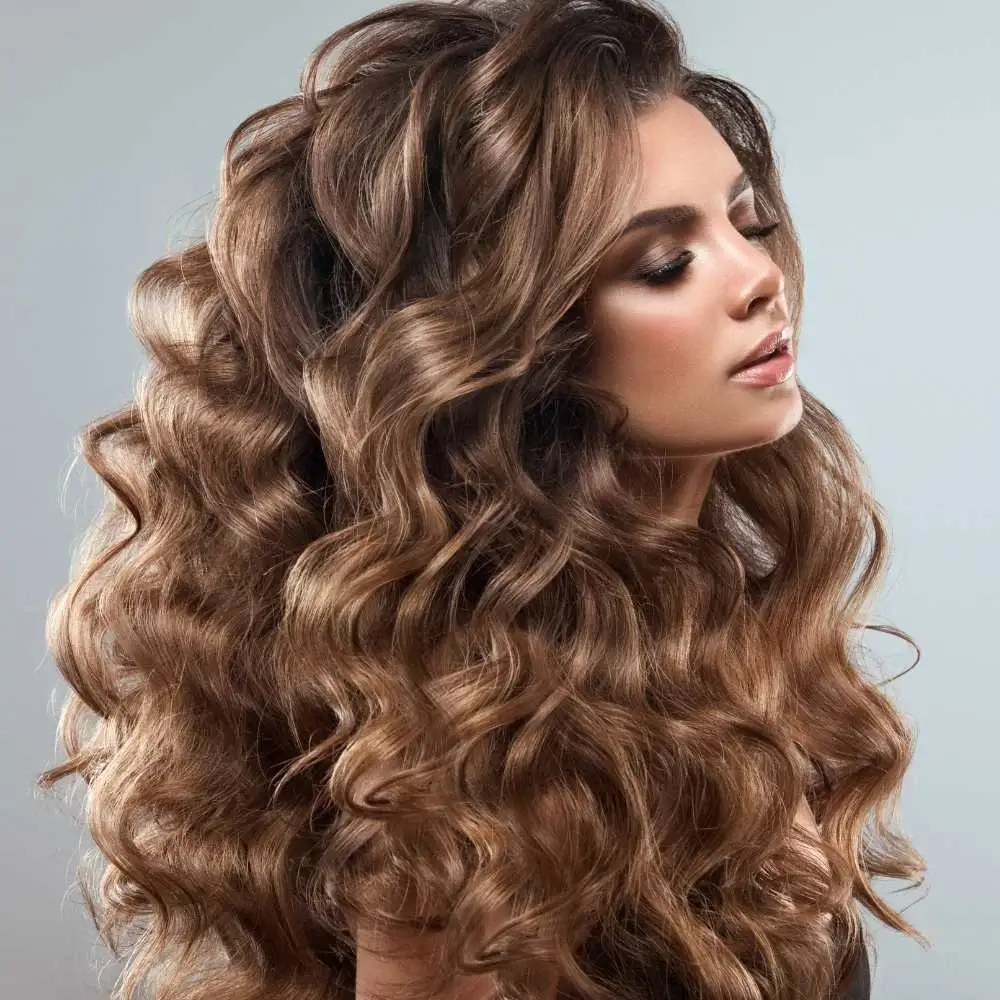 Woman's thick, healthy hair after using the right shampoo and conditioner