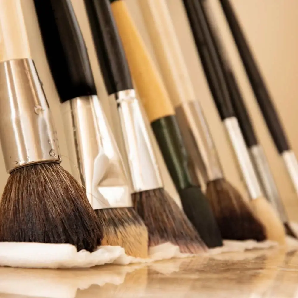 Washing makeup brushes with a gentle soap solution