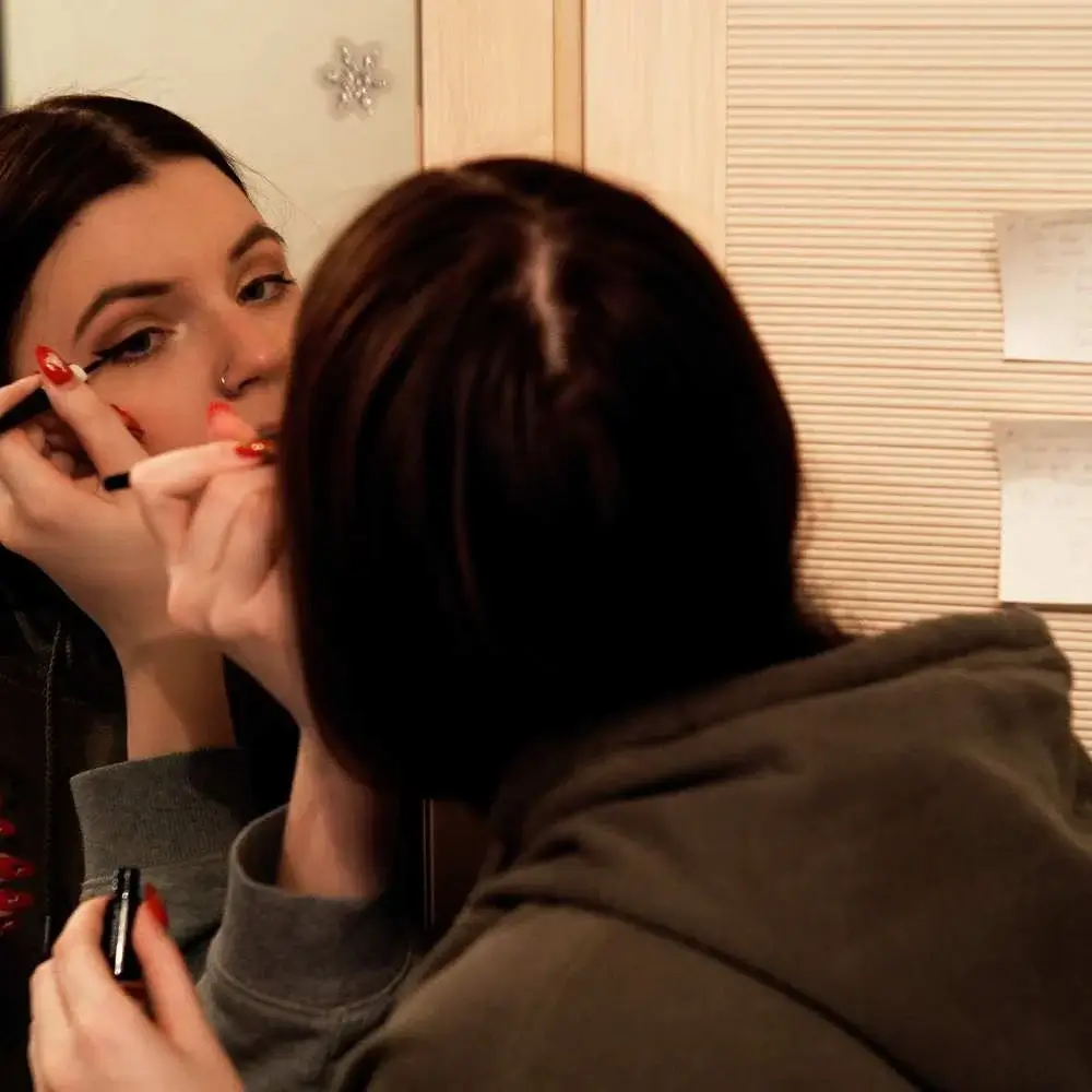 Water-activated eyeliner in use, proving its long-lasting finish on a model's eyes