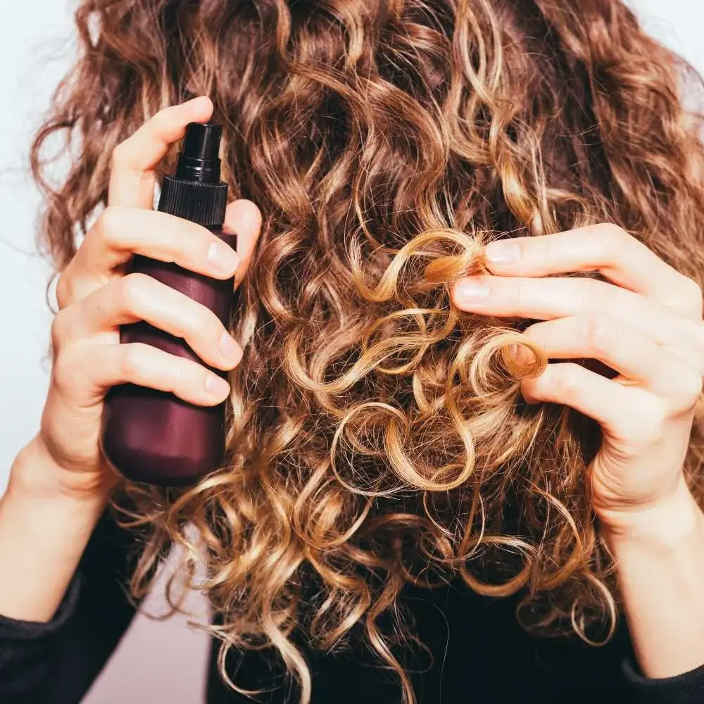 Close-up image of a professional hair spray bottle