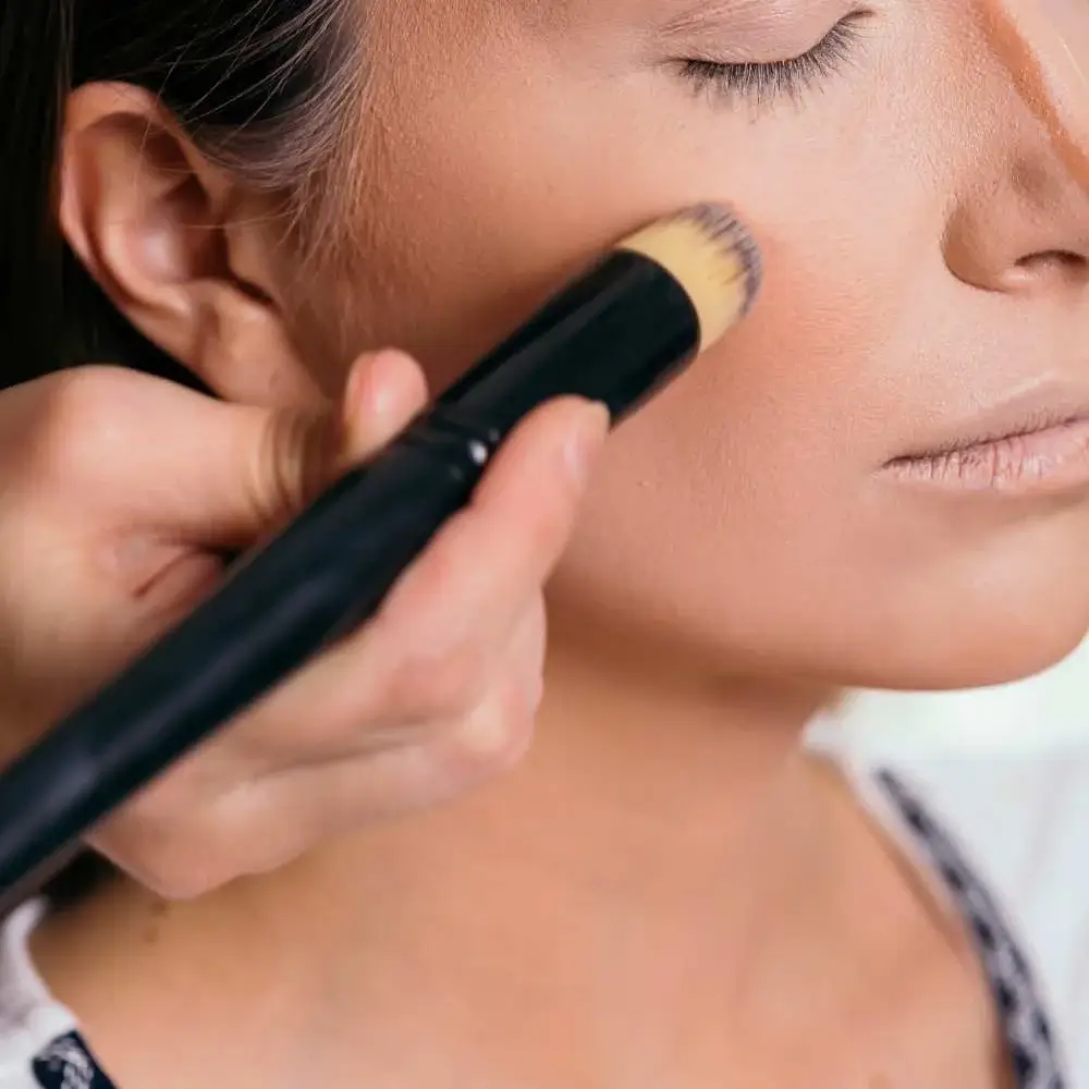 A close-up of a drugstore contour product showing its rich pigment