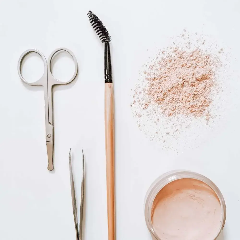 A pair of tweezers specifically designed for eyebrow grooming