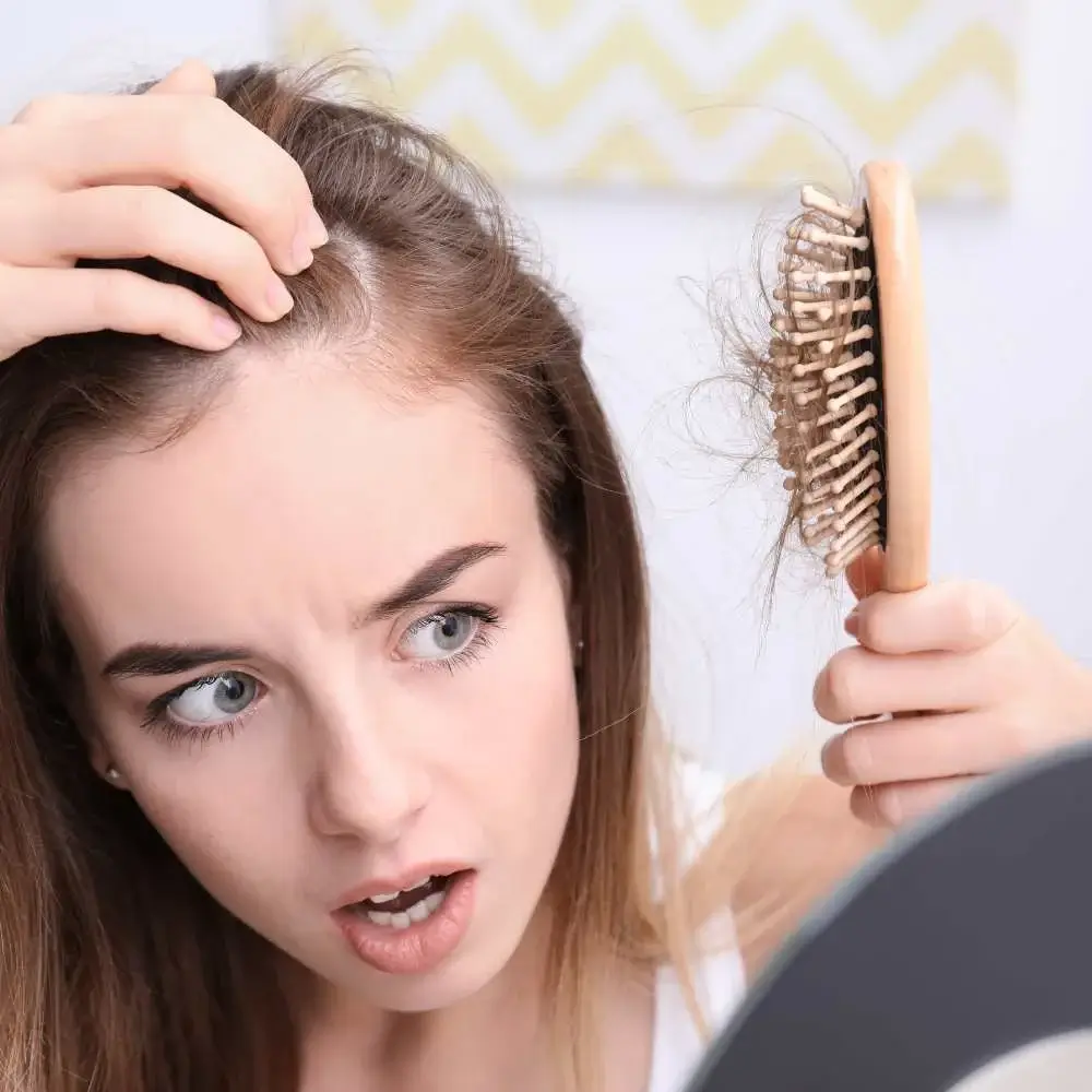 brushing their fine hair to avoid breakage