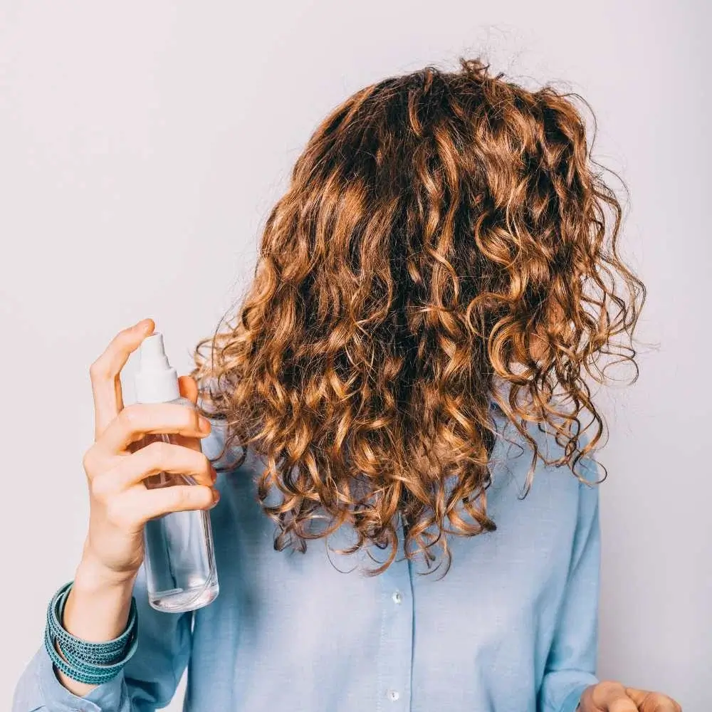 a sleek, modern design hair spray bottle