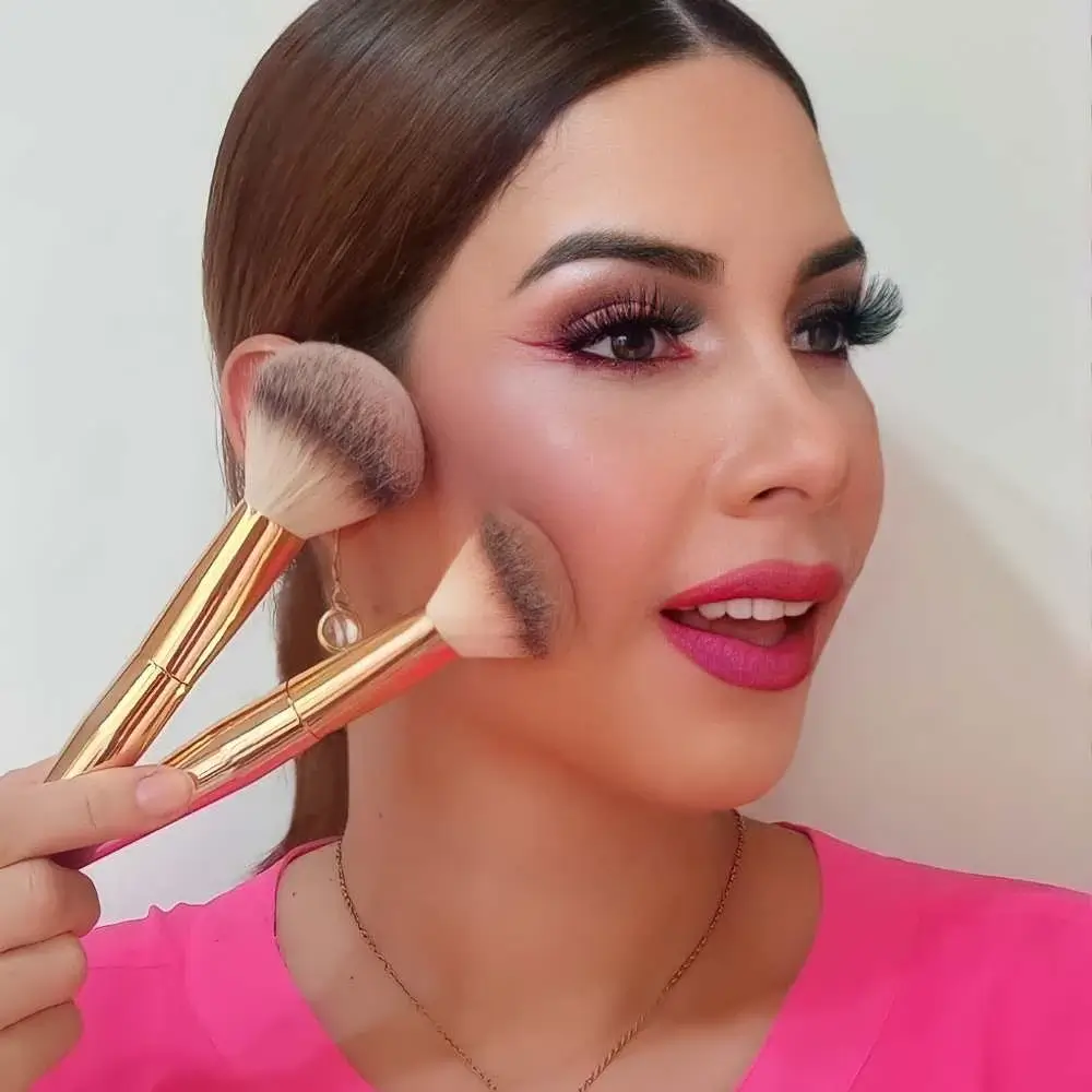 Woman holding a freshly cleaned makeup brush