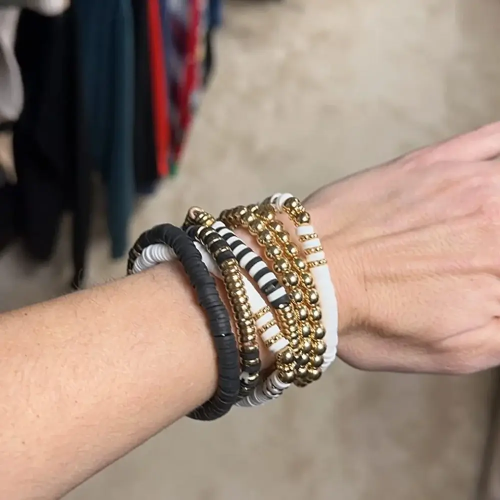 How do you wear layered bracelets?