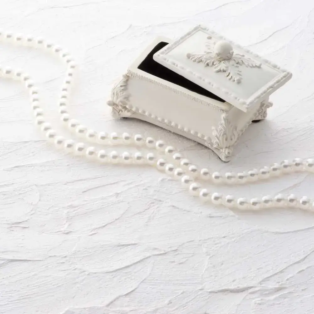 pearl necklace and a jewellery box