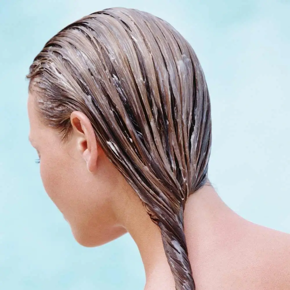 back view of a woman's hair with volumizing conditioner